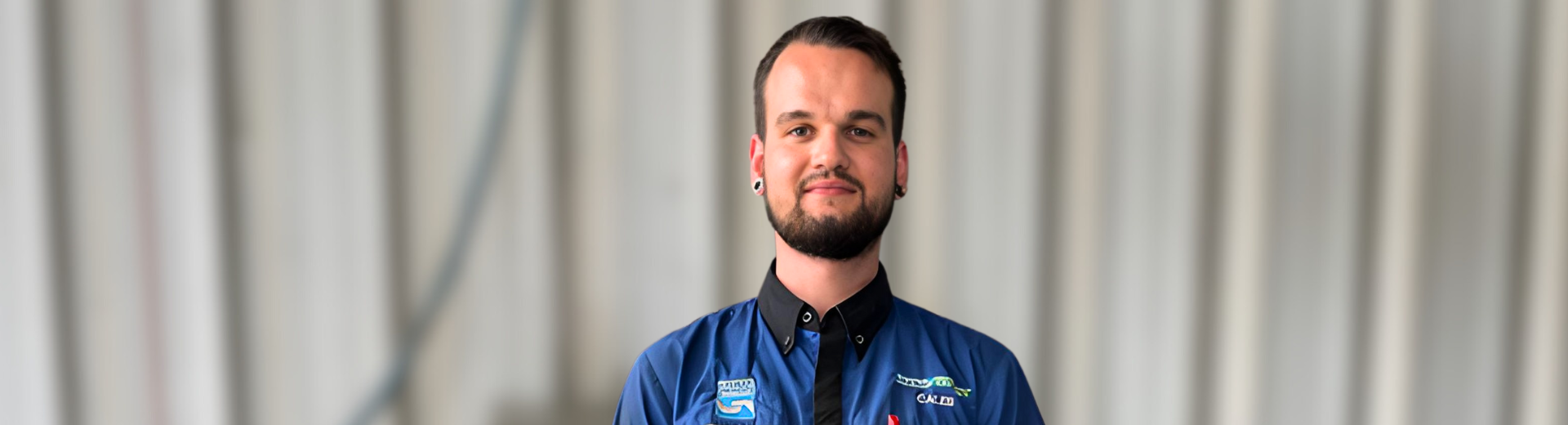 alt="Participant from OCTEC's disability employment services (DES) Shepparton secures employment in an auto trade role"